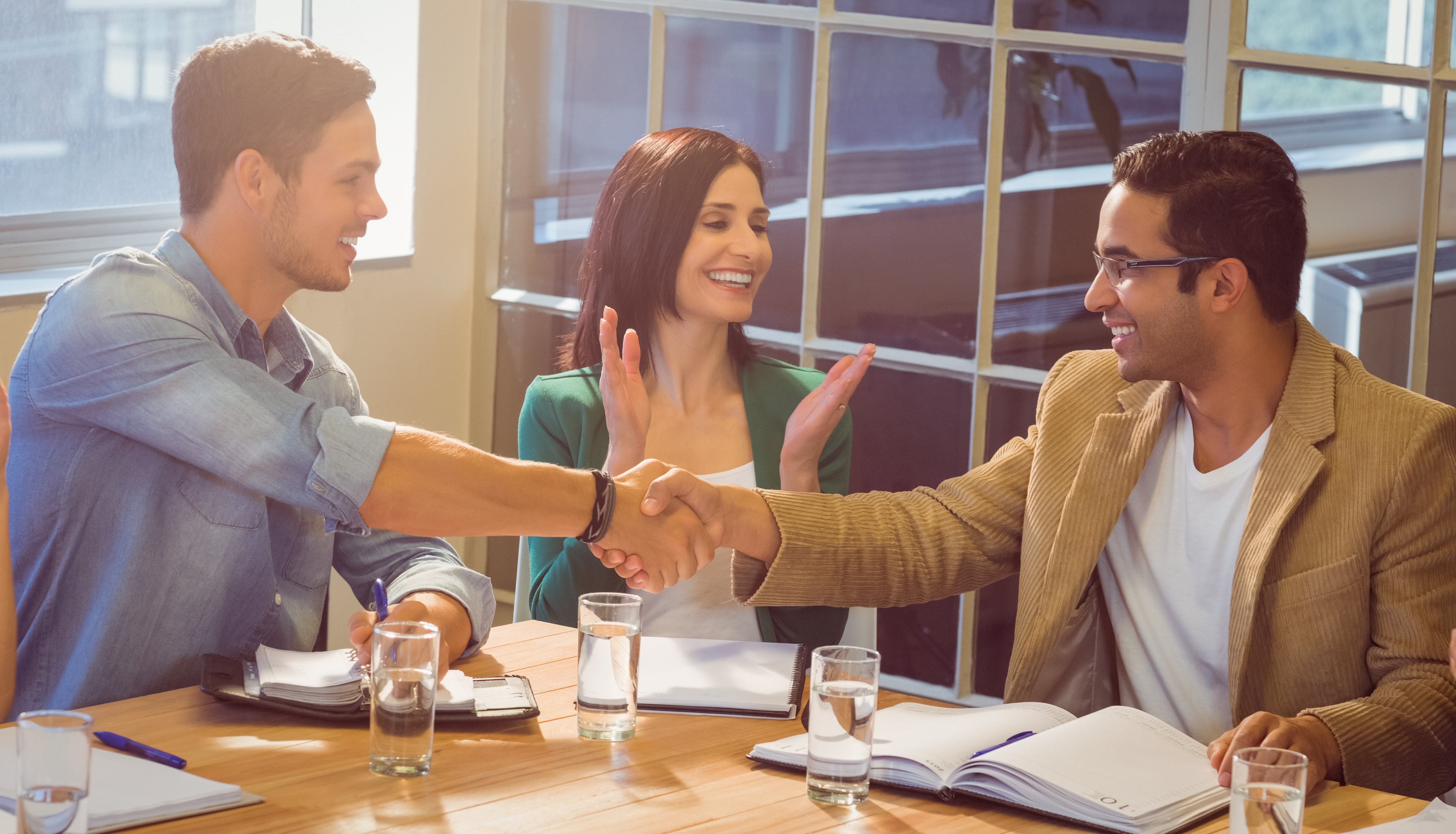 Business people shaking hands